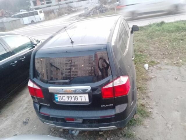 Черный Шевроле Орландо, объемом двигателя 1.8 л и пробегом 160 тыс. км за 7700 $, фото 2 на Automoto.ua