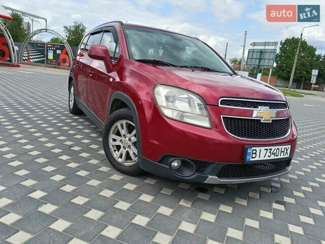 Красный Шевроле Орландо, объемом двигателя 1.8 л и пробегом 233 тыс. км за 9199 $, фото 1 на Automoto.ua