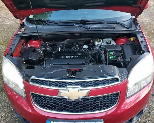 Червоний Шевроле Орландо, об'ємом двигуна 1.8 л та пробігом 215 тис. км за 10500 $, фото 2 на Automoto.ua