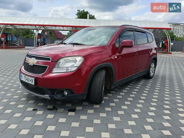 Красный Шевроле Орландо, объемом двигателя 1.8 л и пробегом 233 тыс. км за 9199 $, фото 2 на Automoto.ua