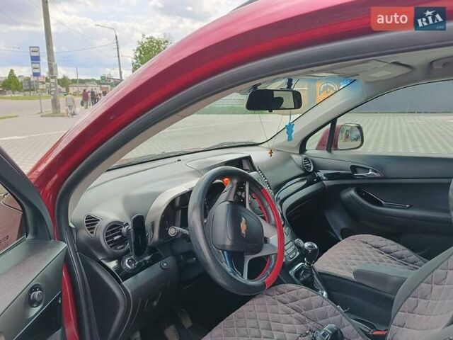 Красный Шевроле Орландо, объемом двигателя 1.8 л и пробегом 233 тыс. км за 9199 $, фото 14 на Automoto.ua