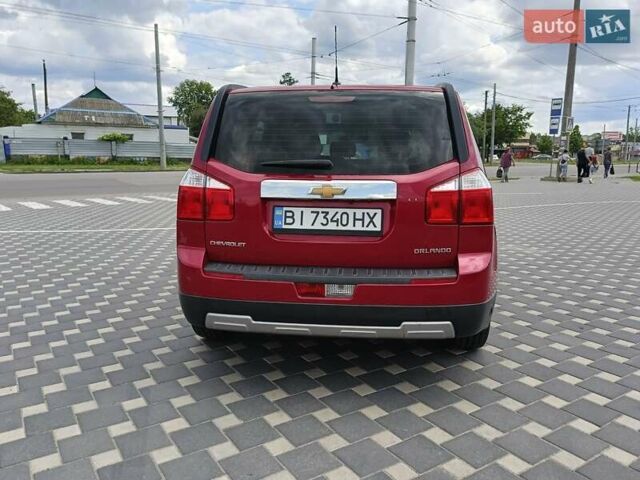 Красный Шевроле Орландо, объемом двигателя 1.8 л и пробегом 233 тыс. км за 9199 $, фото 7 на Automoto.ua