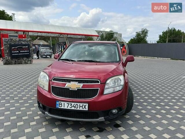 Красный Шевроле Орландо, объемом двигателя 1.8 л и пробегом 233 тыс. км за 9199 $, фото 8 на Automoto.ua