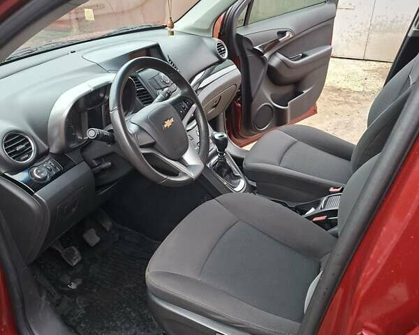 Красный Шевроле Орландо, объемом двигателя 1.8 л и пробегом 55 тыс. км за 9500 $, фото 7 на Automoto.ua