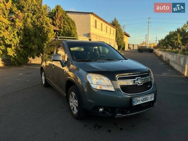 Серый Шевроле Орландо, объемом двигателя 1.8 л и пробегом 245 тыс. км за 9500 $, фото 1 на Automoto.ua