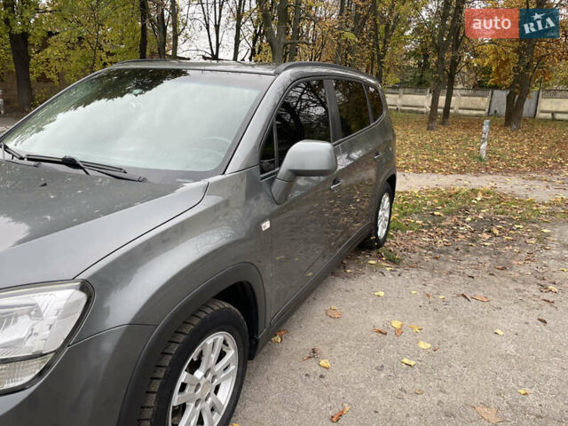 Сірий Шевроле Орландо, об'ємом двигуна 1.8 л та пробігом 192 тис. км за 9800 $, фото 1 на Automoto.ua