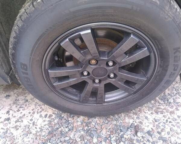 Серый Шевроле Орландо, объемом двигателя 1.8 л и пробегом 168 тыс. км за 8000 $, фото 13 на Automoto.ua