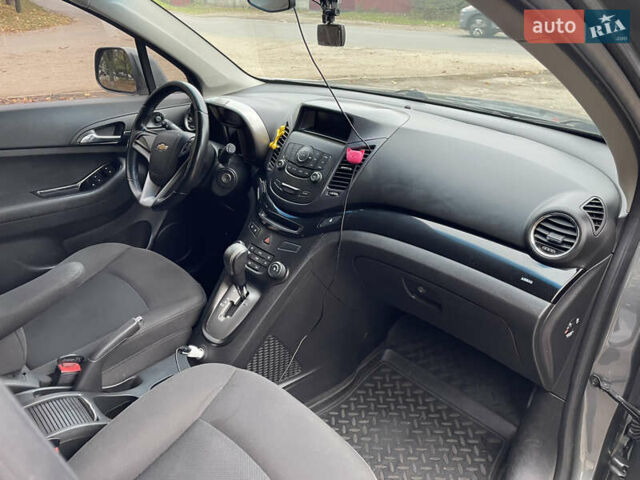 Серый Шевроле Орландо, объемом двигателя 1.8 л и пробегом 247 тыс. км за 9600 $, фото 6 на Automoto.ua