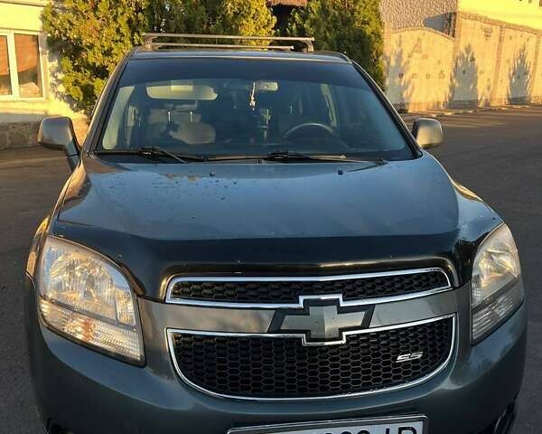 Серый Шевроле Орландо, объемом двигателя 1.8 л и пробегом 245 тыс. км за 9500 $, фото 2 на Automoto.ua