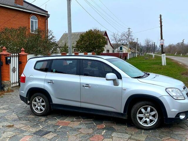 Сірий Шевроле Орландо, об'ємом двигуна 2 л та пробігом 250 тис. км за 8400 $, фото 4 на Automoto.ua