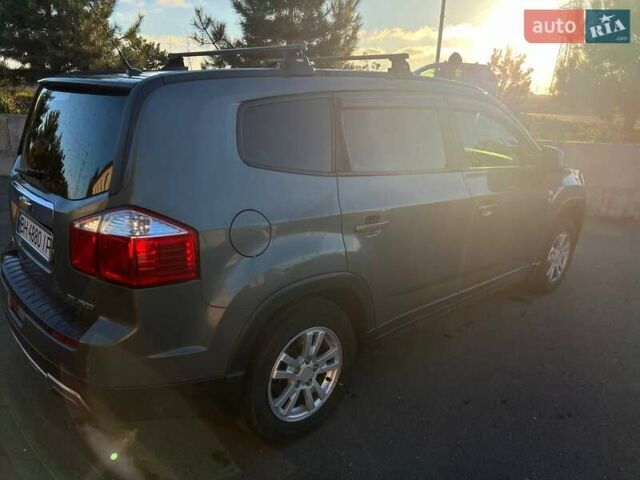 Серый Шевроле Орландо, объемом двигателя 1.8 л и пробегом 245 тыс. км за 9500 $, фото 5 на Automoto.ua