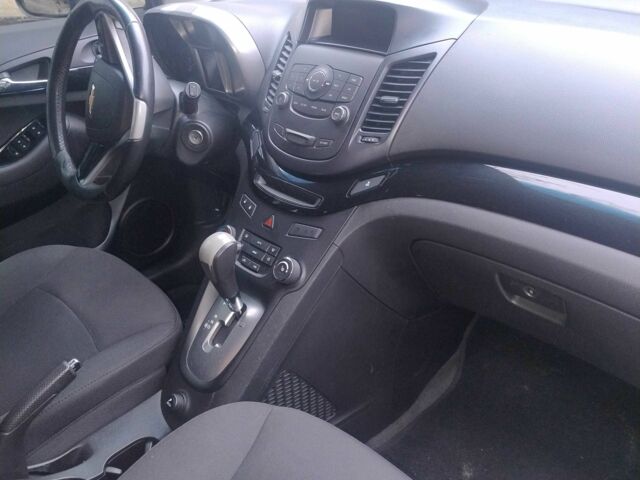 Серый Шевроле Орландо, объемом двигателя 1.8 л и пробегом 168 тыс. км за 8200 $, фото 1 на Automoto.ua