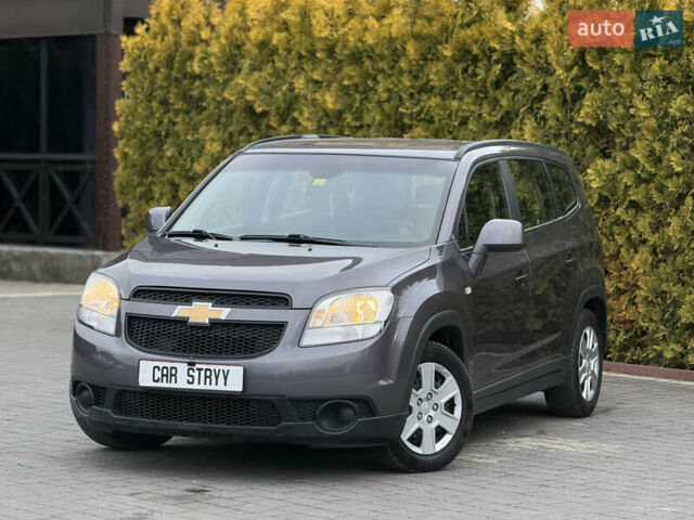 Серый Шевроле Орландо, объемом двигателя 1.8 л и пробегом 217 тыс. км за 7500 $, фото 1 на Automoto.ua