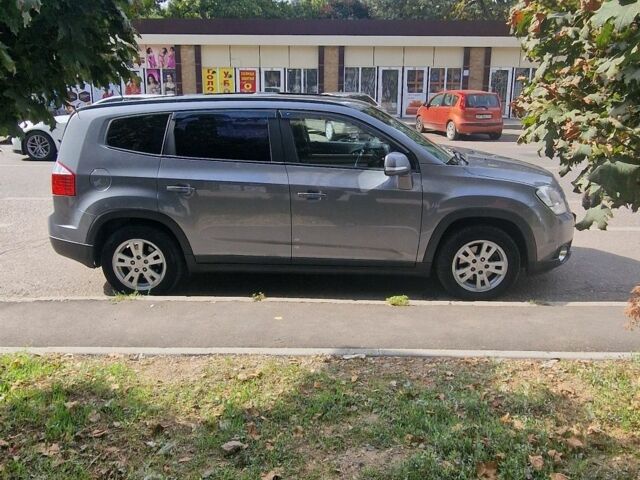 Серый Шевроле Орландо, объемом двигателя 1.6 л и пробегом 247 тыс. км за 11100 $, фото 2 на Automoto.ua