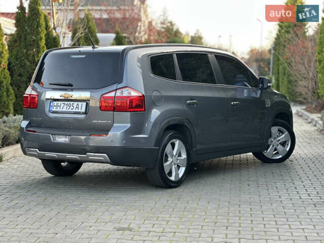 Серый Шевроле Орландо, объемом двигателя 1.6 л и пробегом 75 тыс. км за 12999 $, фото 6 на Automoto.ua