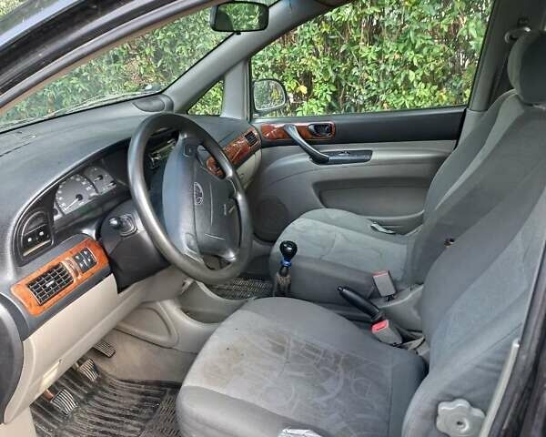 Черный Шевроле Реззо, объемом двигателя 2.01 л и пробегом 331 тыс. км за 1200 $, фото 9 на Automoto.ua