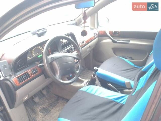 Черный Шевроле Реззо, объемом двигателя 2.01 л и пробегом 331 тыс. км за 1200 $, фото 20 на Automoto.ua