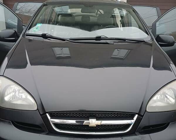 Черный Шевроле Реззо, объемом двигателя 2 л и пробегом 165 тыс. км за 4200 $, фото 1 на Automoto.ua