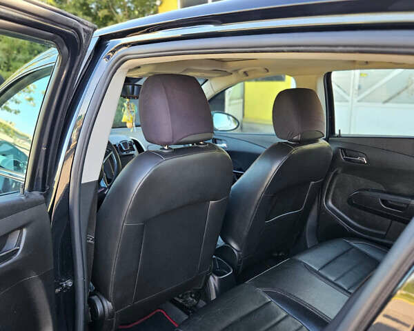 Черный Шевроле Соник, объемом двигателя 1.36 л и пробегом 144 тыс. км за 7500 $, фото 3 на Automoto.ua