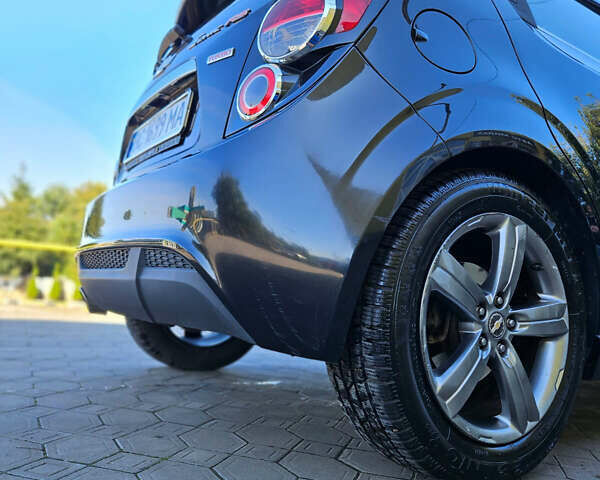 Черный Шевроле Соник, объемом двигателя 1.36 л и пробегом 144 тыс. км за 7500 $, фото 1 на Automoto.ua