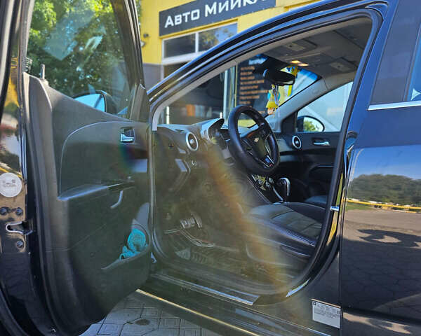 Черный Шевроле Соник, объемом двигателя 1.36 л и пробегом 144 тыс. км за 7500 $, фото 11 на Automoto.ua