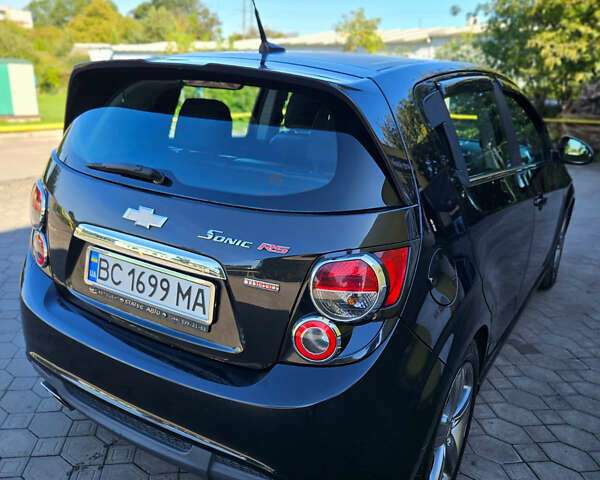 Черный Шевроле Соник, объемом двигателя 1.36 л и пробегом 144 тыс. км за 7500 $, фото 2 на Automoto.ua