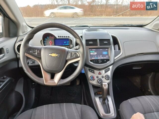 Черный Шевроле Соник, объемом двигателя 1.8 л и пробегом 210 тыс. км за 7500 $, фото 6 на Automoto.ua