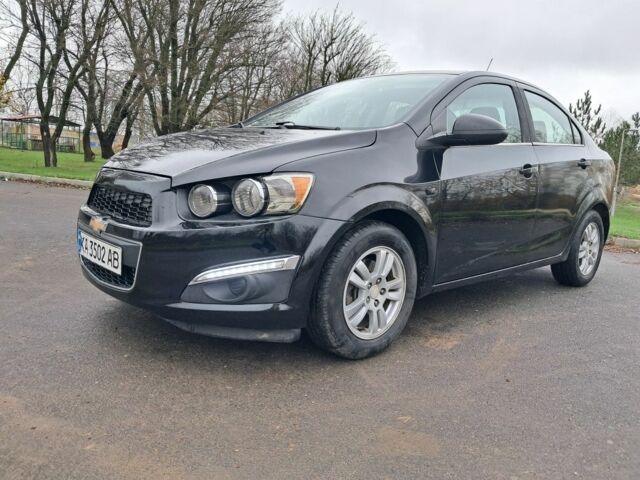 Черный Шевроле Соник, объемом двигателя 1.8 л и пробегом 101 тыс. км за 5400 $, фото 2 на Automoto.ua