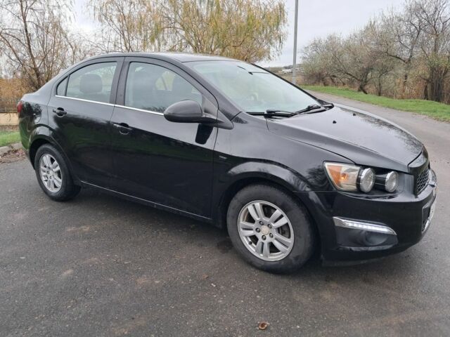 Черный Шевроле Соник, объемом двигателя 1.8 л и пробегом 101 тыс. км за 5400 $, фото 4 на Automoto.ua