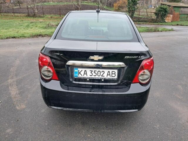 Черный Шевроле Соник, объемом двигателя 1.8 л и пробегом 101 тыс. км за 5400 $, фото 6 на Automoto.ua