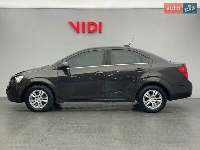 Коричневый Шевроле Соник, объемом двигателя 1.6 л и пробегом 163 тыс. км за 7471 $, фото 2 на Automoto.ua