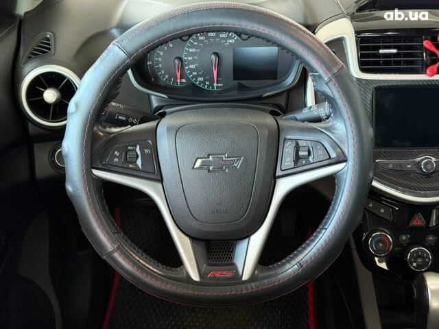 Красный Шевроле Соник, объемом двигателя 1.8 л и пробегом 80 тыс. км за 8990 $, фото 21 на Automoto.ua