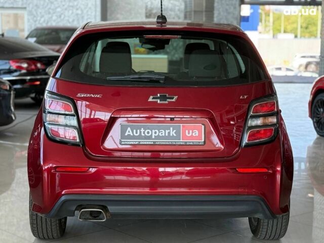 Красный Шевроле Соник, объемом двигателя 1.8 л и пробегом 80 тыс. км за 8990 $, фото 9 на Automoto.ua