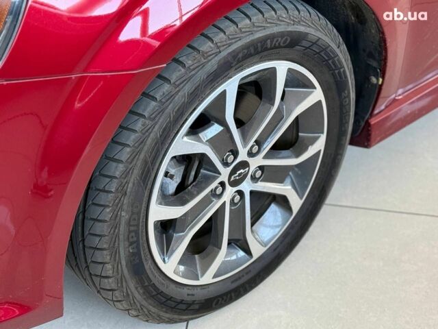 Красный Шевроле Соник, объемом двигателя 1.8 л и пробегом 80 тыс. км за 8990 $, фото 5 на Automoto.ua