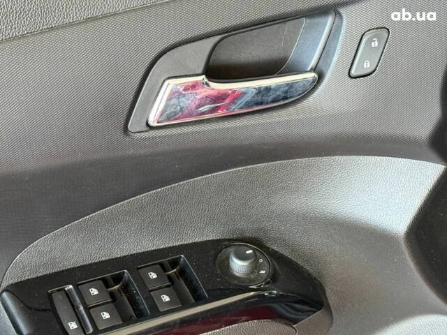 Красный Шевроле Соник, объемом двигателя 1.8 л и пробегом 80 тыс. км за 8990 $, фото 12 на Automoto.ua