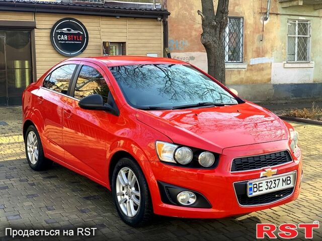 Червоний Шевроле Сонік, об'ємом двигуна 1.8 л та пробігом 192 тис. км за 6900 $, фото 2 на Automoto.ua