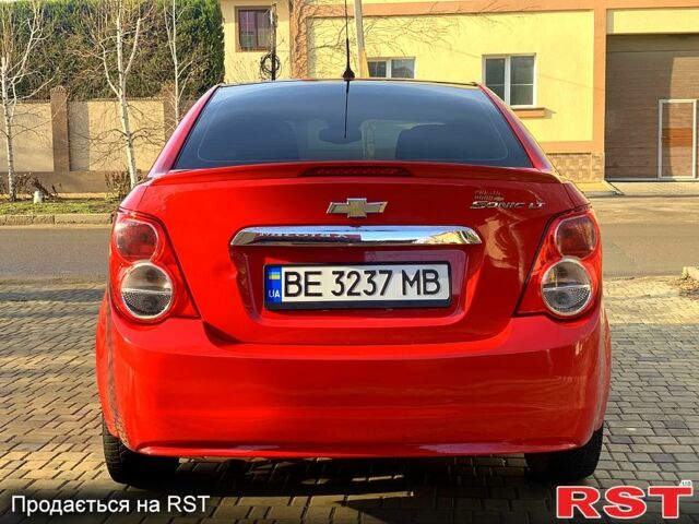 Червоний Шевроле Сонік, об'ємом двигуна 1.8 л та пробігом 192 тис. км за 6900 $, фото 7 на Automoto.ua