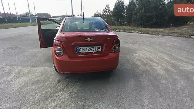 Красный Шевроле Соник, объемом двигателя 1.8 л и пробегом 222 тыс. км за 5800 $, фото 8 на Automoto.ua