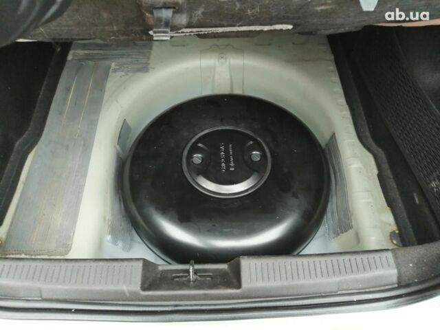 Серый Шевроле Соник, объемом двигателя 1.8 л и пробегом 247 тыс. км за 7300 $, фото 19 на Automoto.ua