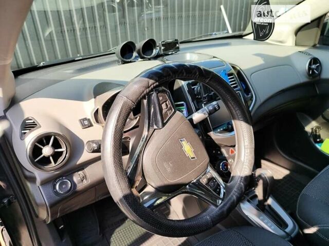 Серый Шевроле Соник, объемом двигателя 1.8 л и пробегом 220 тыс. км за 9000 $, фото 33 на Automoto.ua