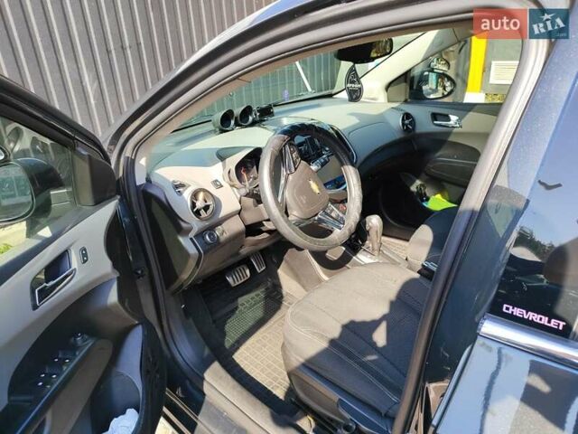 Серый Шевроле Соник, объемом двигателя 1.8 л и пробегом 220 тыс. км за 9000 $, фото 32 на Automoto.ua
