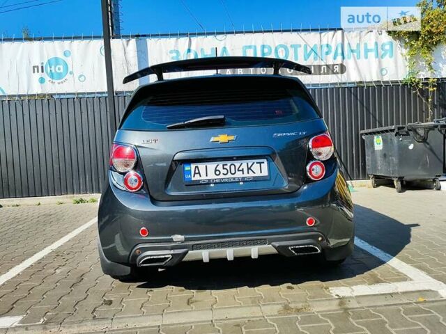 Серый Шевроле Соник, объемом двигателя 1.8 л и пробегом 220 тыс. км за 9000 $, фото 12 на Automoto.ua