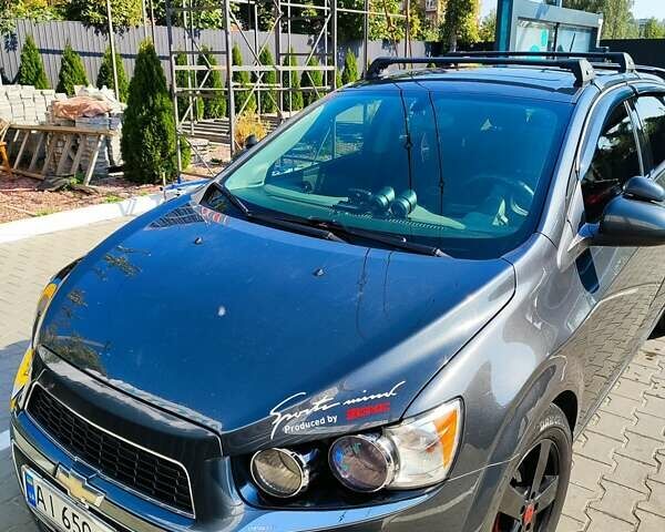 Серый Шевроле Соник, объемом двигателя 1.8 л и пробегом 220 тыс. км за 9000 $, фото 8 на Automoto.ua