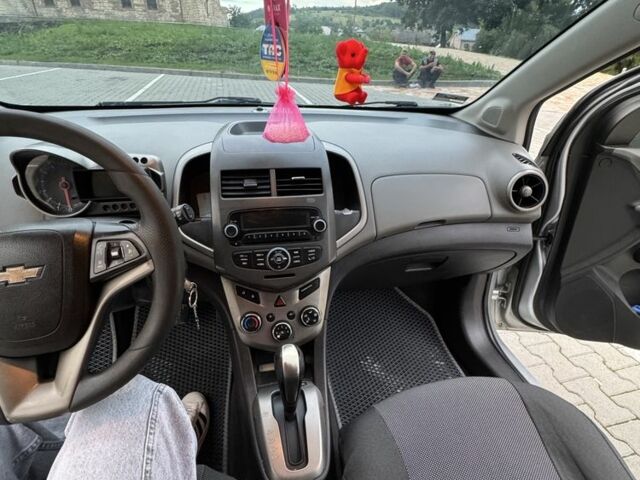 Серый Шевроле Соник, объемом двигателя 1.8 л и пробегом 251 тыс. км за 5950 $, фото 11 на Automoto.ua