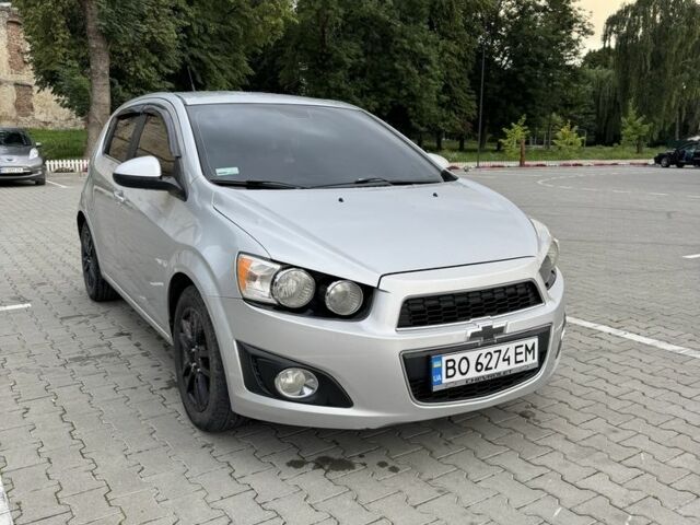 Серый Шевроле Соник, объемом двигателя 1.8 л и пробегом 251 тыс. км за 5950 $, фото 1 на Automoto.ua