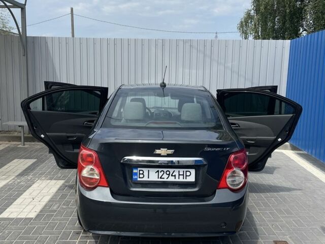 Сірий Шевроле Сонік, об'ємом двигуна 1.8 л та пробігом 173 тис. км за 6600 $, фото 19 на Automoto.ua