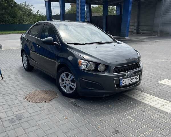 Шевроле Соник 2015 в Полтаве на Automoto.ua Серый Шевроле Соник, объемом двигателя 1.8 л и пробегом 173 тыс. км за 7000 $, фото 2 на Automoto.ua