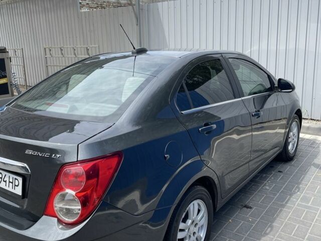 Сірий Шевроле Сонік, об'ємом двигуна 1.8 л та пробігом 173 тис. км за 6600 $, фото 7 на Automoto.ua