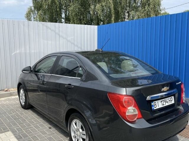Серый Шевроле Соник, объемом двигателя 1.8 л и пробегом 173 тыс. км за 7500 $, фото 6 на Automoto.ua