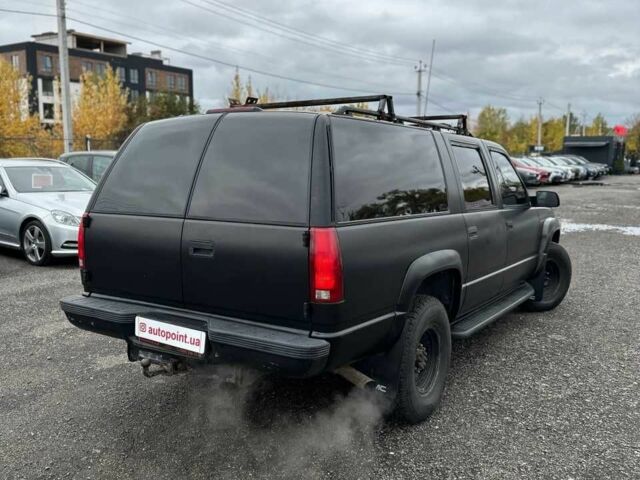 Черный Шевроле Субурбан, объемом двигателя 7.5 л и пробегом 565 тыс. км за 12000 $, фото 2 на Automoto.ua